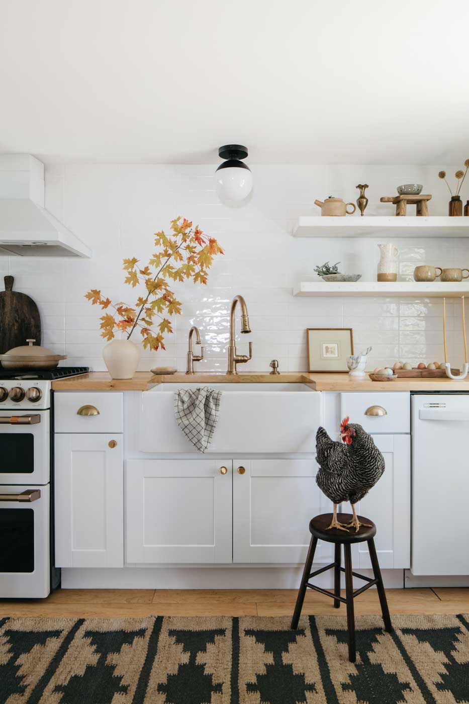64 Indoor Outdoor Living With A Resident Chicken Taking Up A Stop On The Kitchen Stool