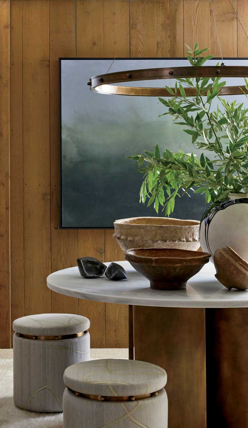 98 Sr2023 11 042 Light Fixture, Table, Ottomans, Bowls From Opame, Ceramic Bowl From Boyan Moskov And Two Pieces From Kat Evans And Art By Krueger. Krueger Is Featured In Collective Cool
