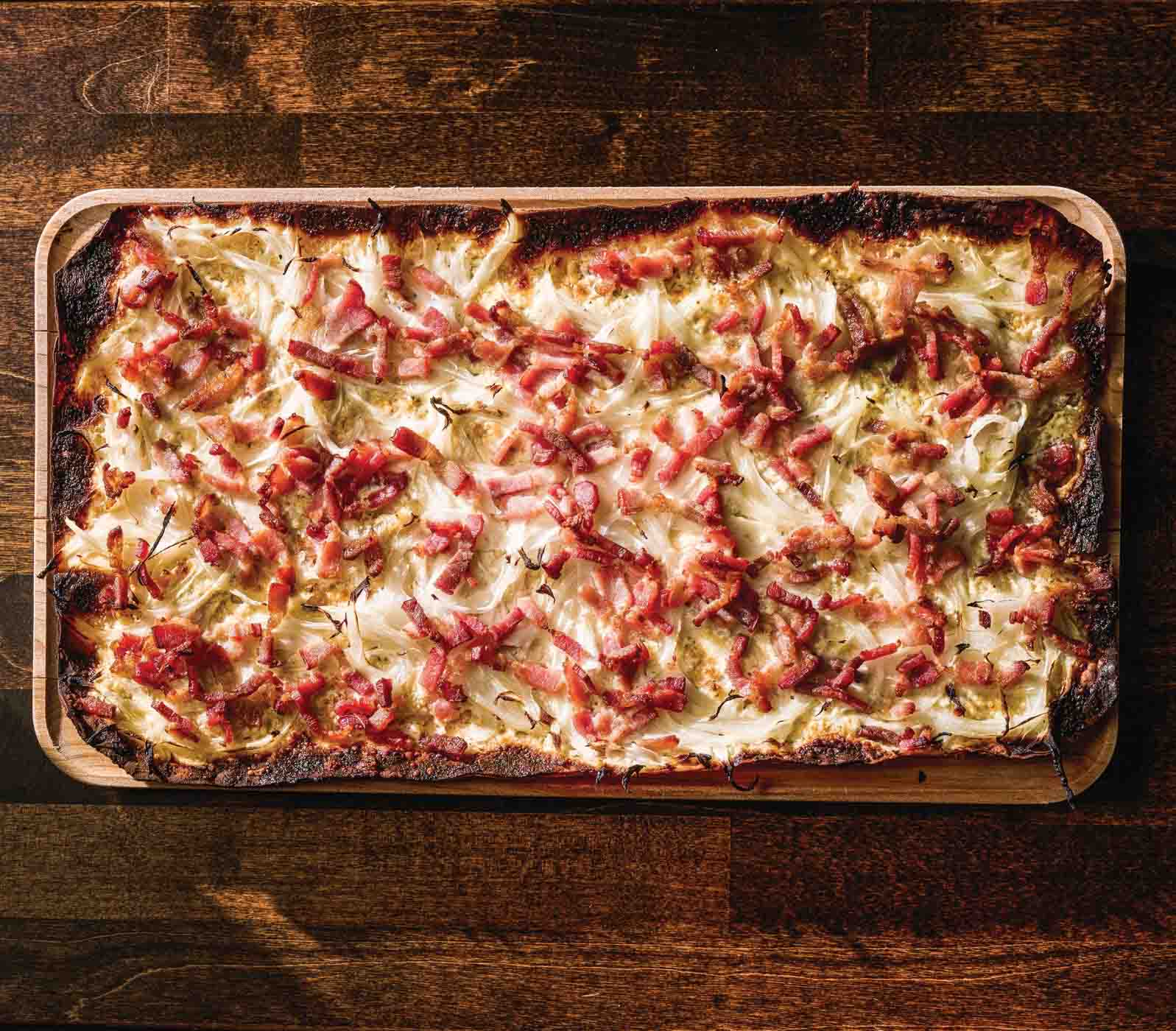 64 Tarte Flambee, With Smoked Bacon, Sweet Onions, And Fromage Blanc