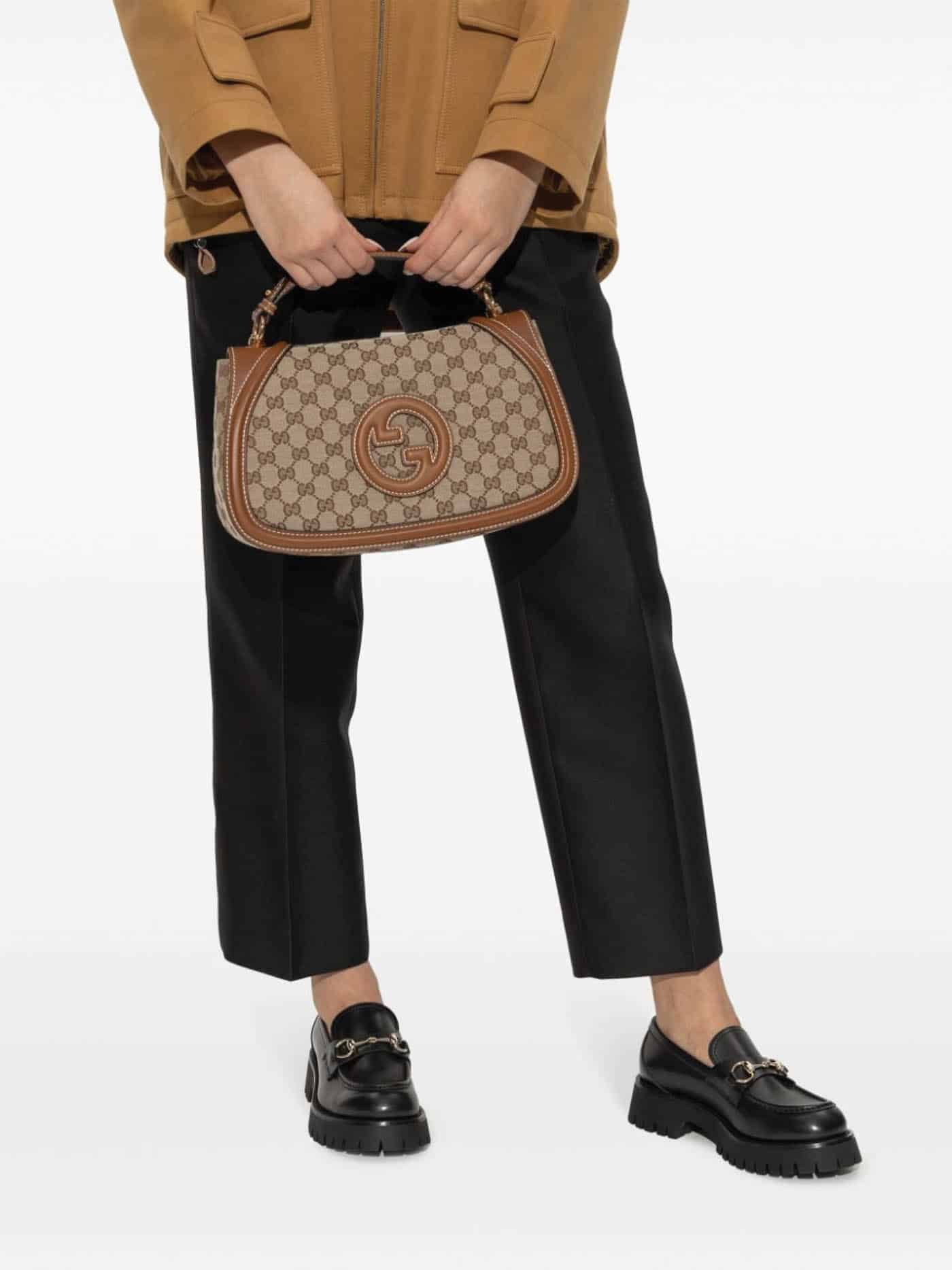 32 Gucci Mini Blondie Shoulder Bag, $3,966, Neimanmarcus.com