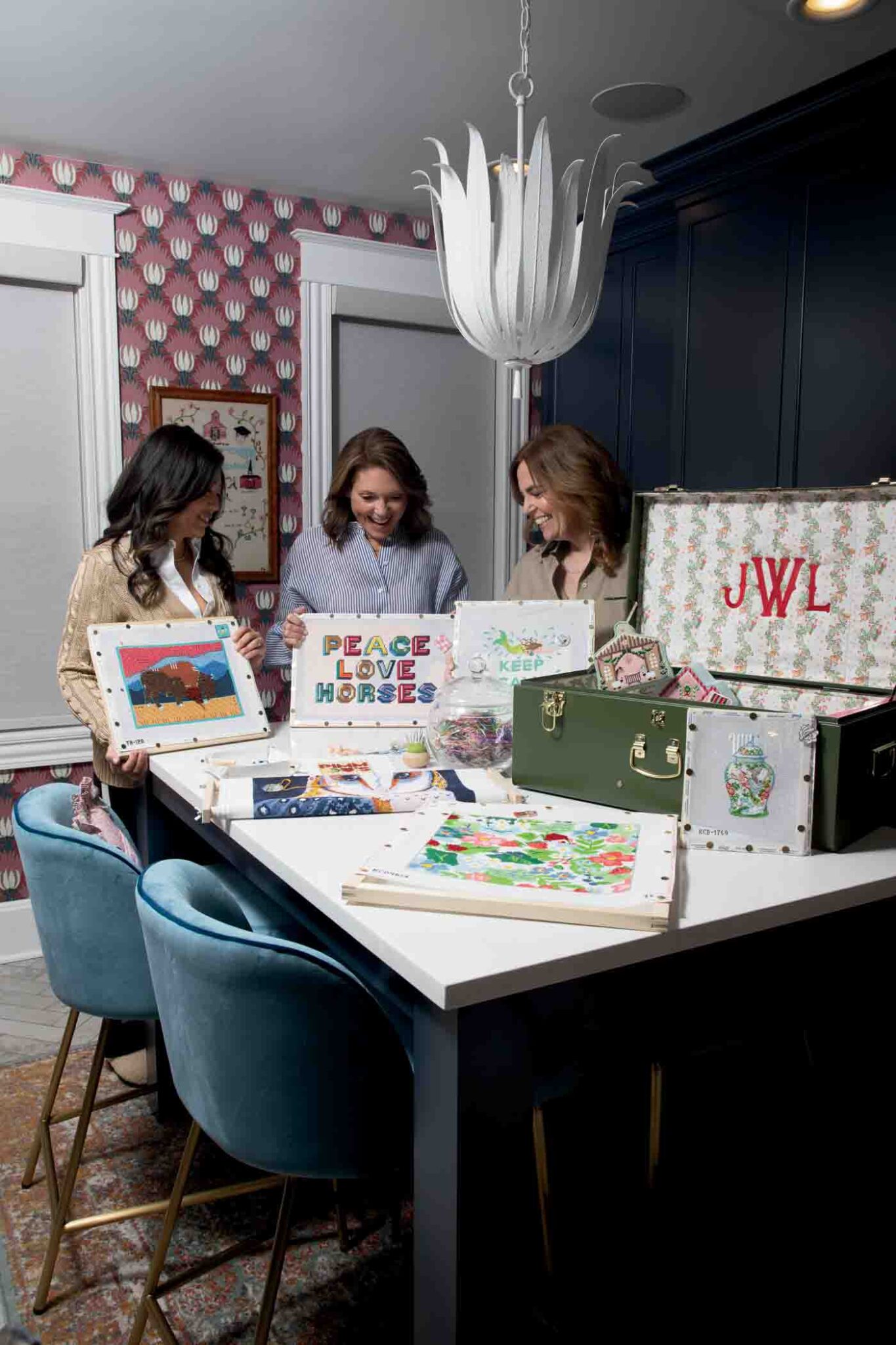 50 The Women In Welsh's Dedicated Needlepoint Room. Many Hours Are Logged Needlepointing Projects While Chatting With Friends Around This Table. 