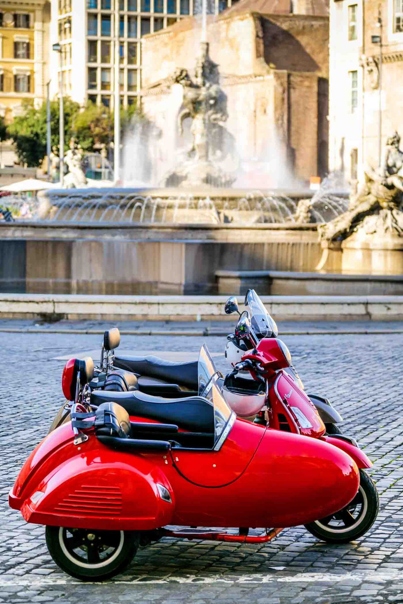 Some Lovely And Colorful Vespa Scooters Parked In Piazza Della Repubblica In The Heart Of Rome