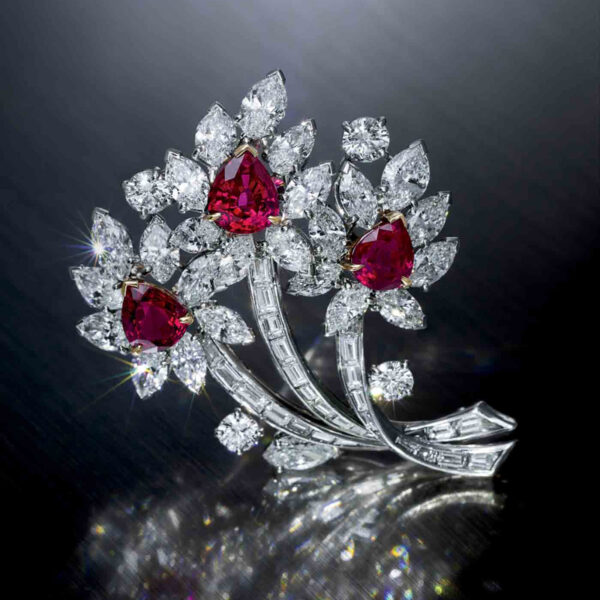 58 Main An Important Van Cleef & Arpels Burmese Ruby And Diamond Brooch (background)