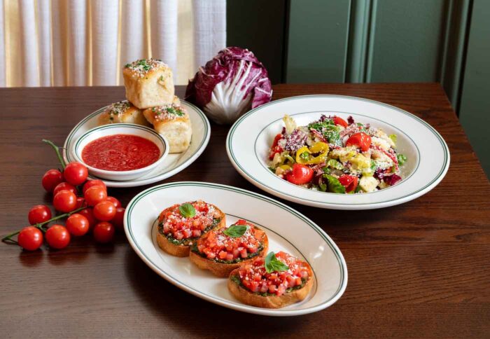 Starters Including Garlic Knots, Bruschetta Pomororo, And Chopped Salad