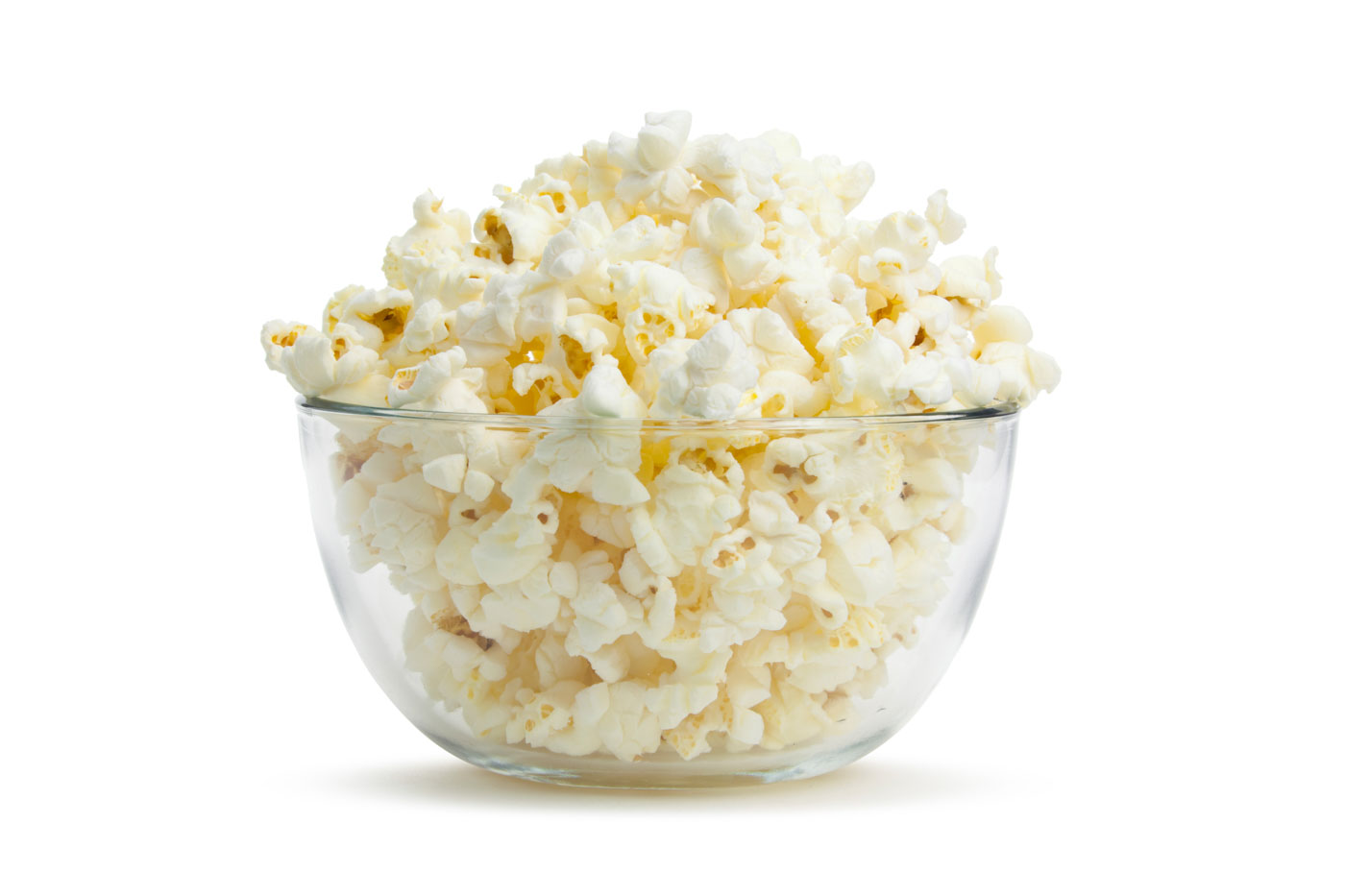 Close Up Of Clear Bowl With Freshly Popped Corn