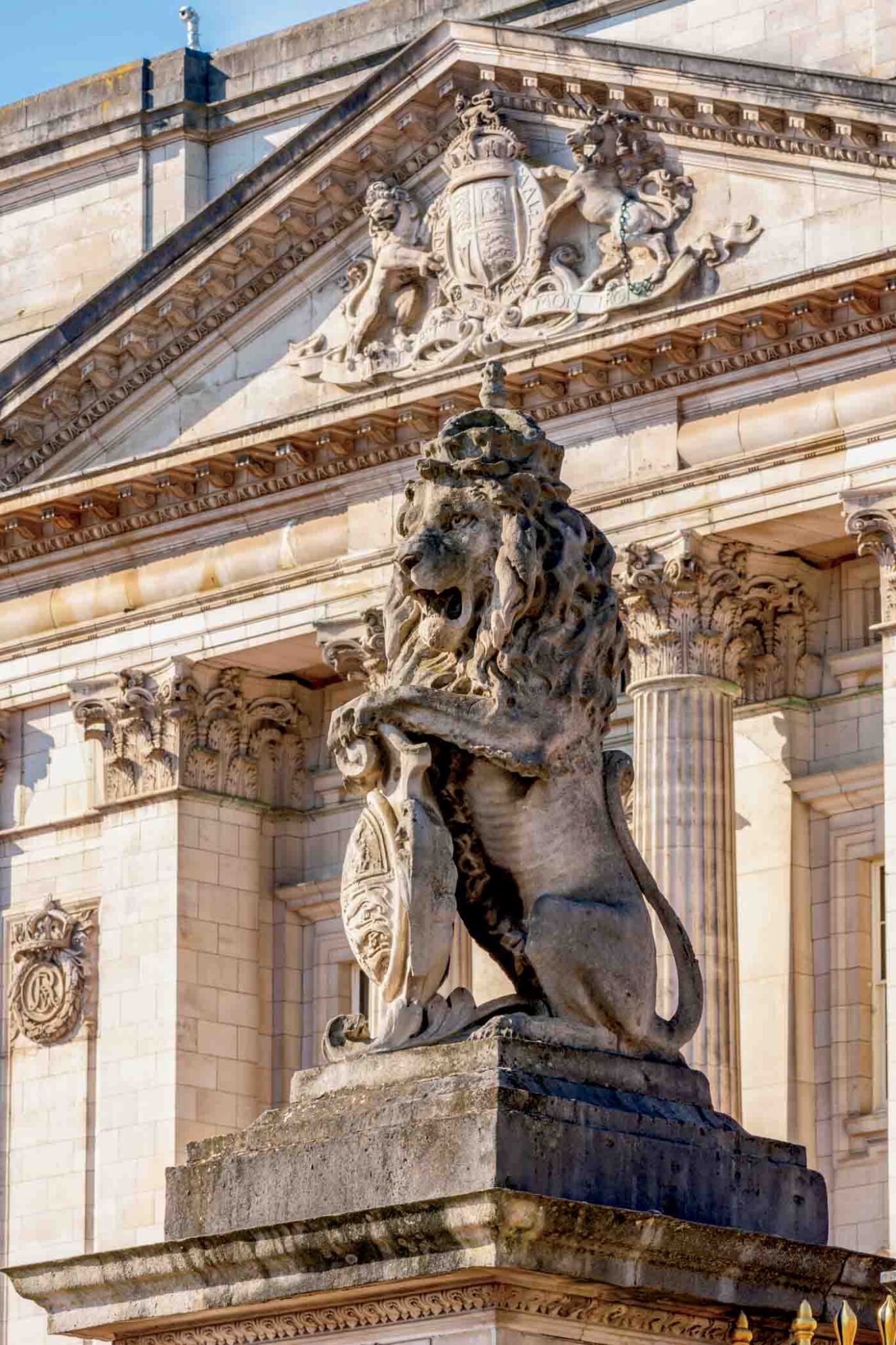 Lion Sculpture Symbol Of England At Buckingham Palace In London, Uk