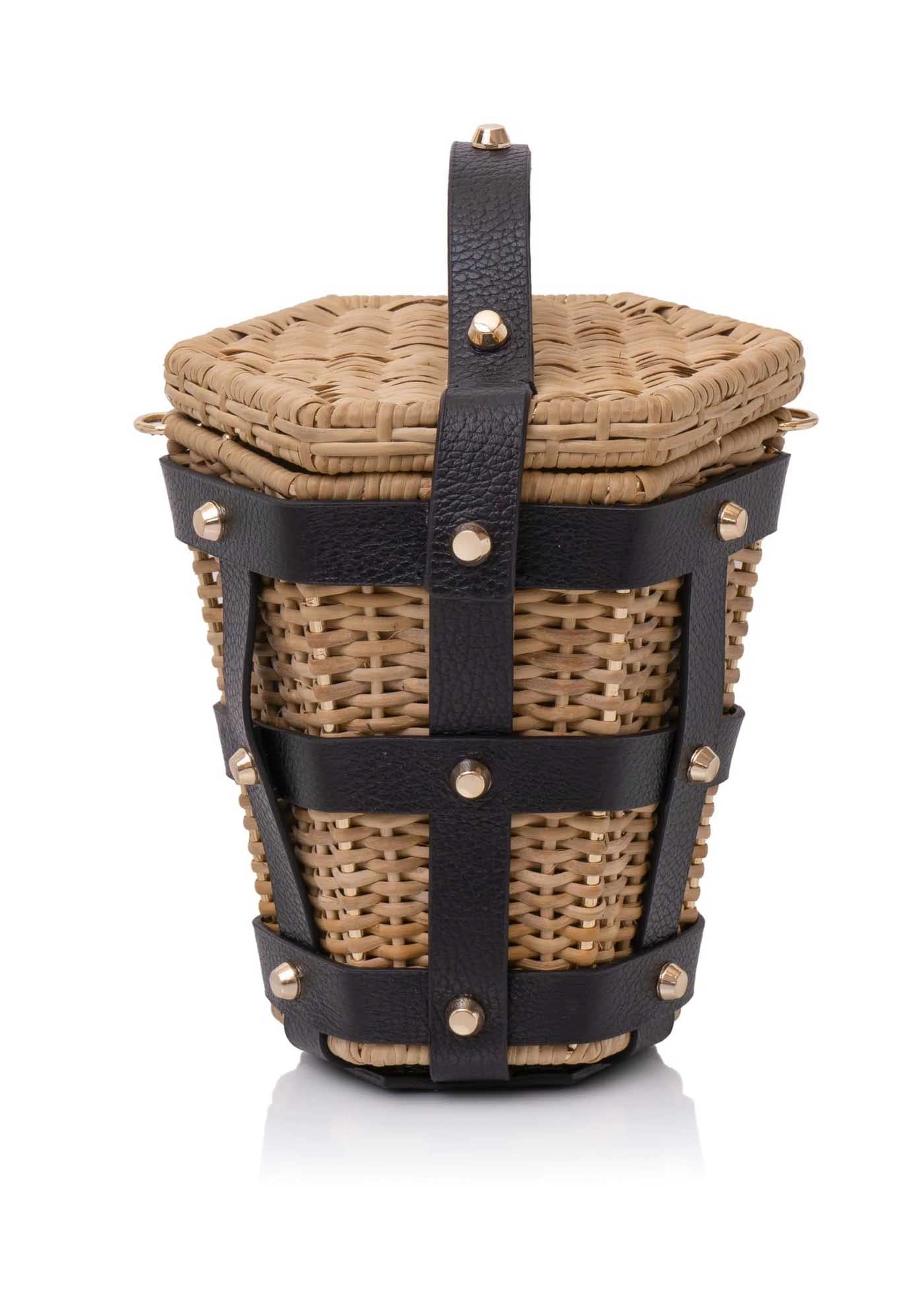 42 Waiwai Wild Cage Bag In Black, $640, Lilliealexanderboutique.com