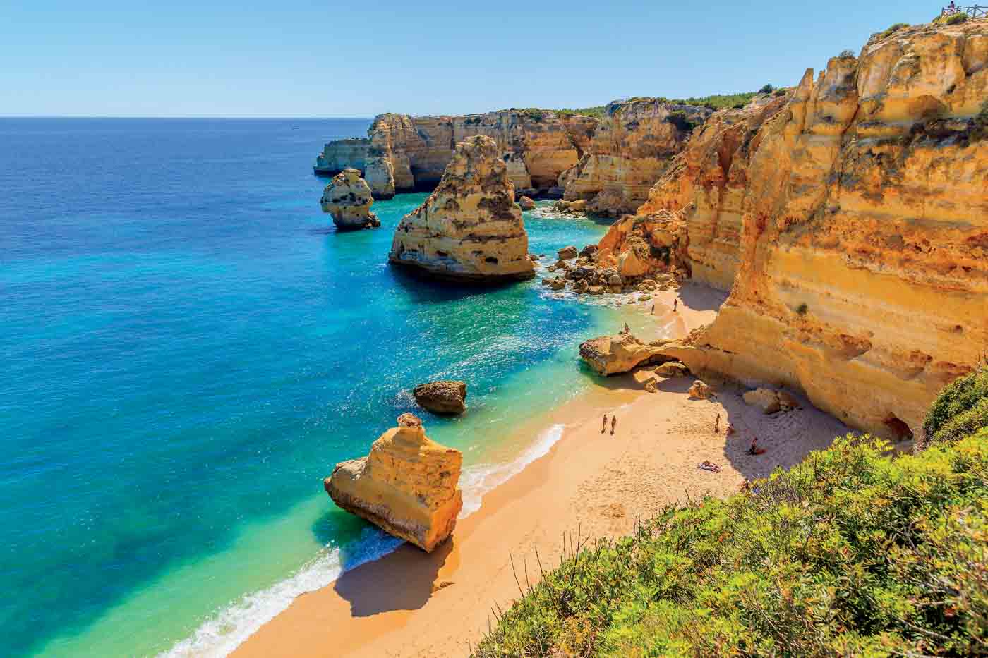 View Of Beautiful Marinha Beach With Crystal Clear Turquoise Water Near Carvoeiro Town, Algarve Region, Portugal